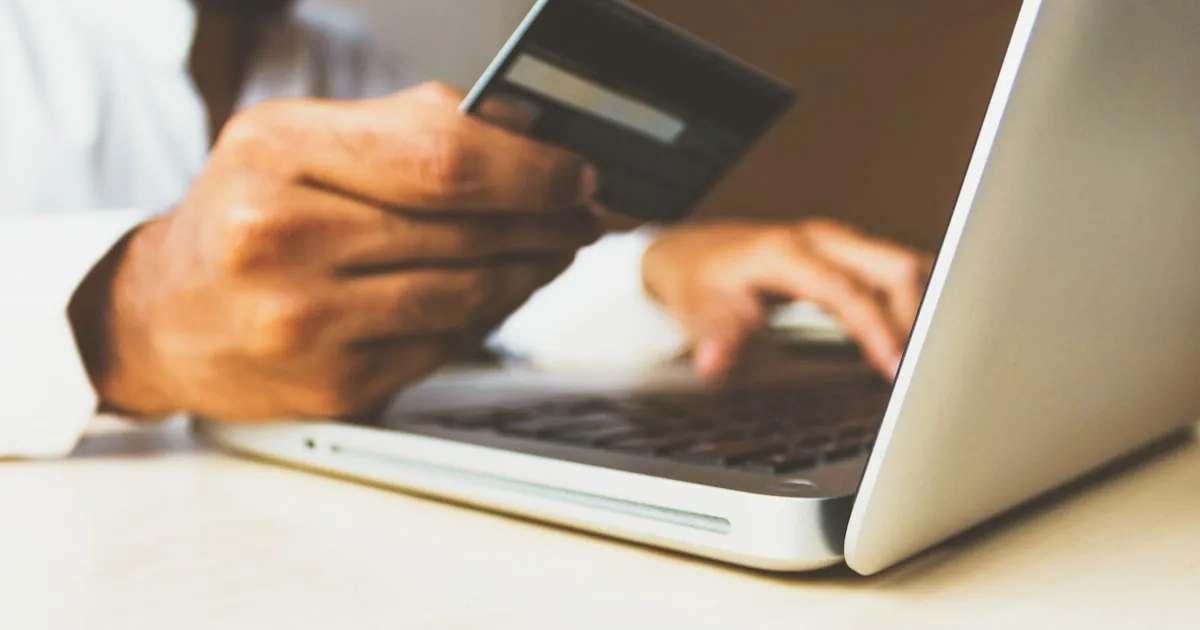 Payment terminal beside a laptop, standing in for reviewing Shopify checkout before an order

---

# content