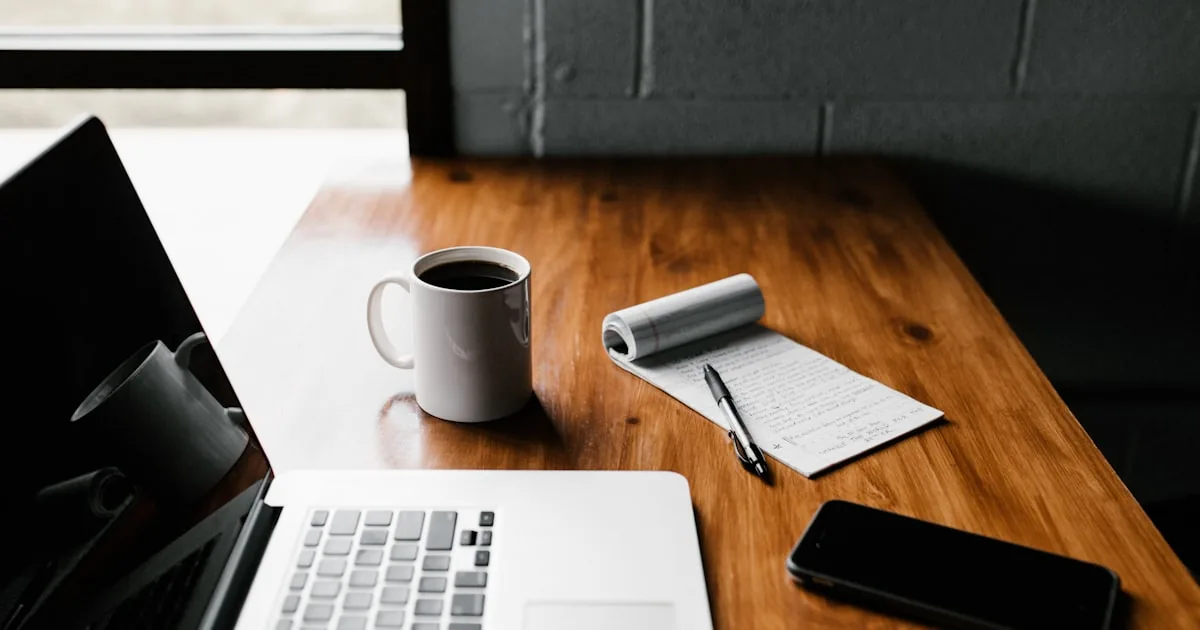 Printed policy pages beside a laptop, standing in for Shopify About and policy page SEO

---

# content